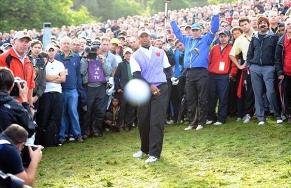 Tiger Woods Hits A Golf Ball Into The Camera