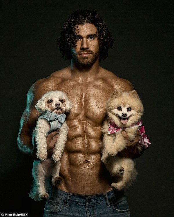 Man With Great Abs And Two Puppies