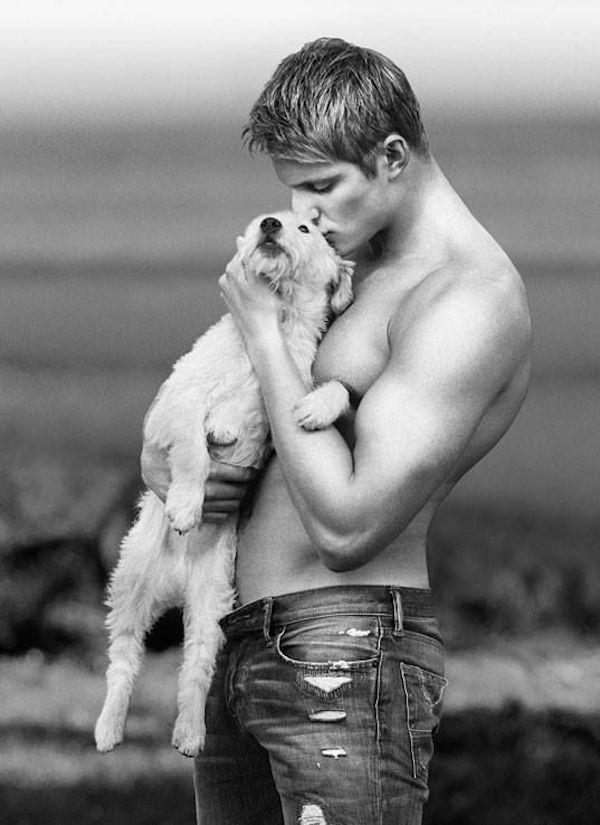 Cute Guy With A Puppy