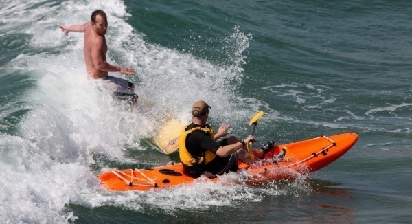 Surfer And Kayaker