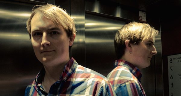 Man Reflected In Elevator