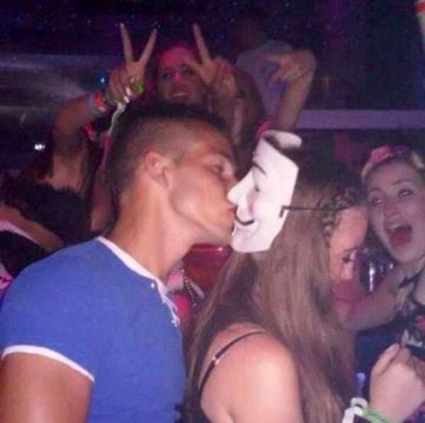 Guy Kissing Vendetta Mask
