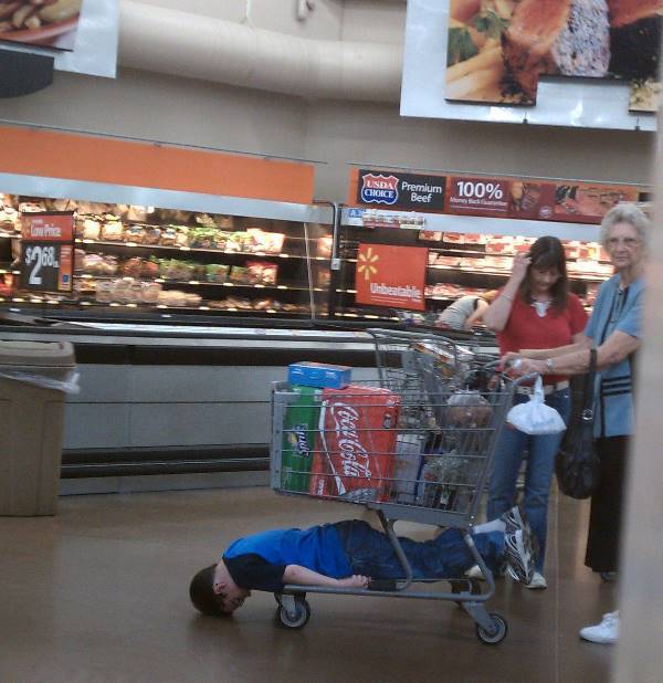 Kid In Grocery Cart At Walmart