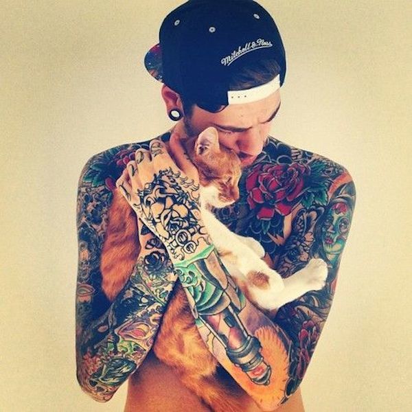 Man With Tattoos And Kitten