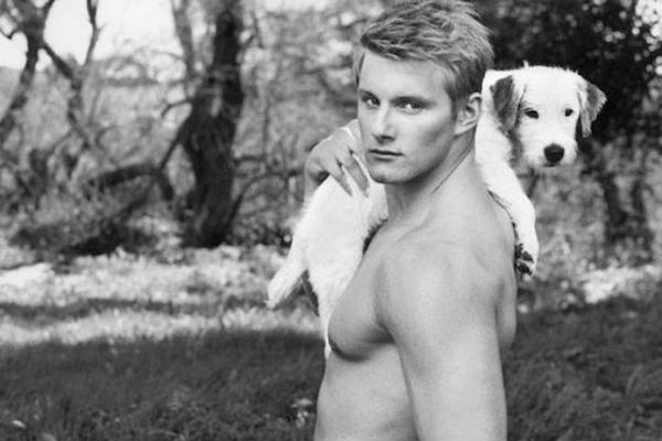Shirtless Guy With A Puppy