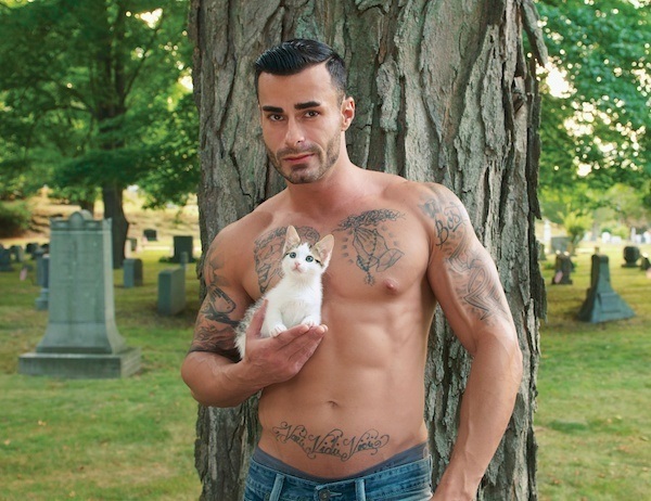 Shirtless Man With Kitten