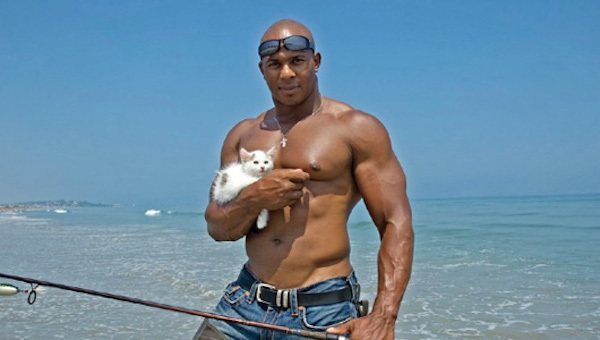 Shirtless Guy With A Kitten