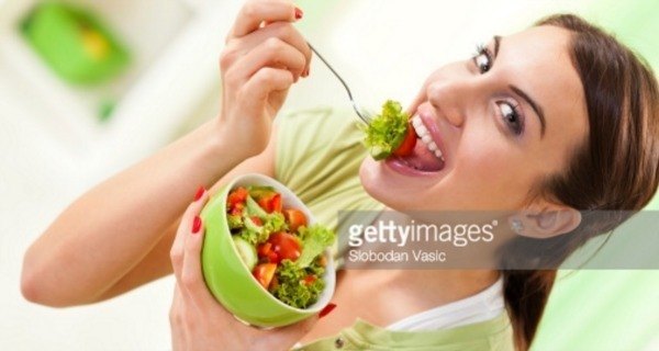 Watermark Woman Eating Salad