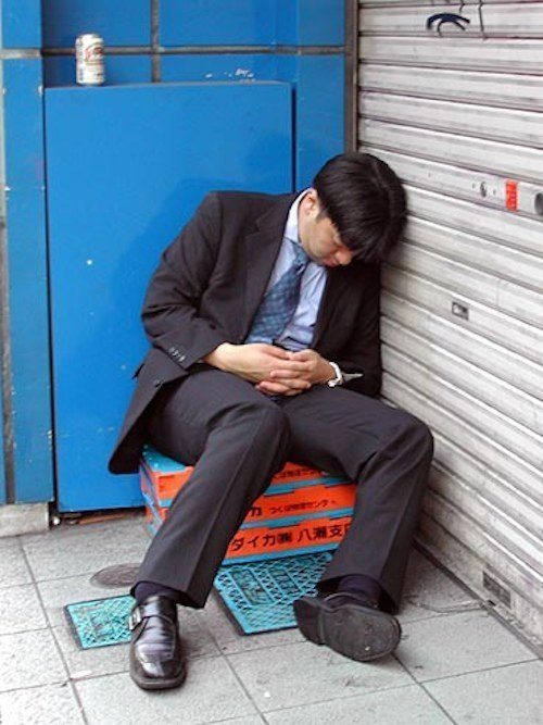 Sleeping In Tokyo Doorway