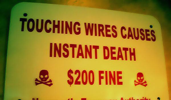 Touching Wires Sign