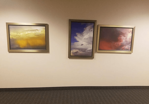 Misaligned Pictures In Hallway